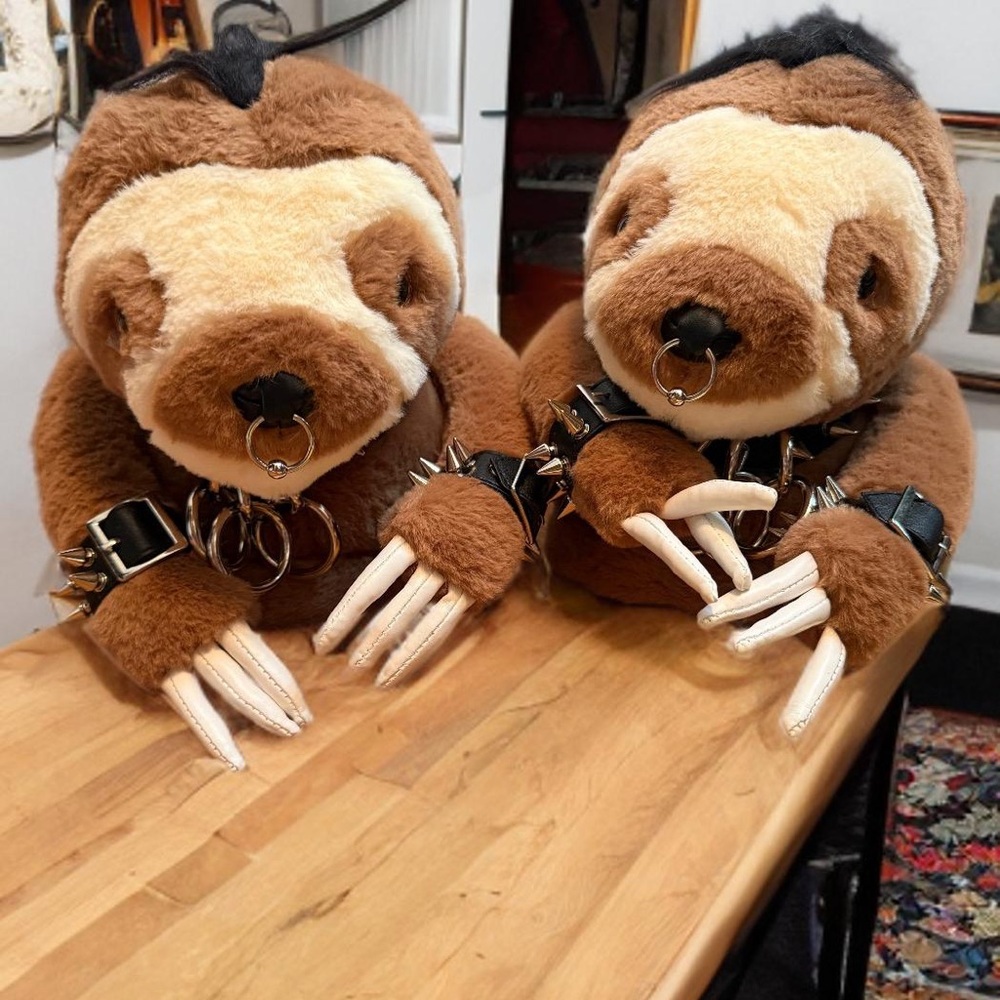 Dolls Kill Brown Sloth Slippers with Black Spiked Accessories